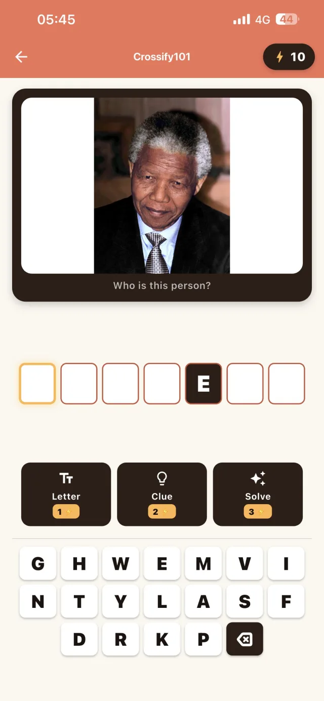 Picture clue asking “Who is this person?” above answer boxes, hint buttons and a letter bank
